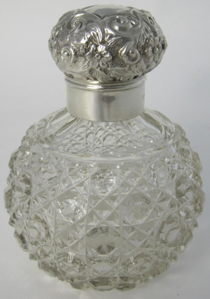 12. Victorian Avon Silver Glass Perfume Bottle