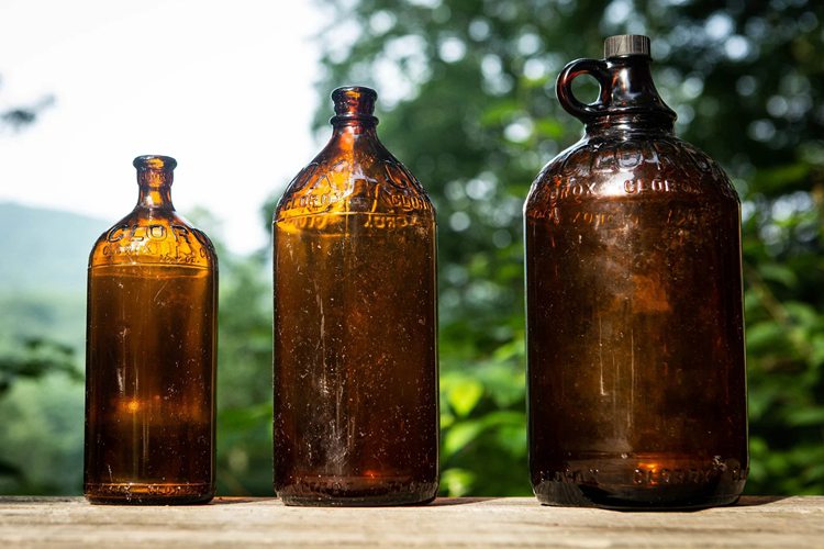 2. Set of Three Amber Vintage Clorox Glass Bottles