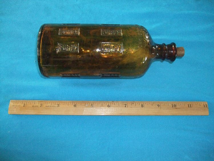 8. Vintage Brown Empty Clorox Bottle