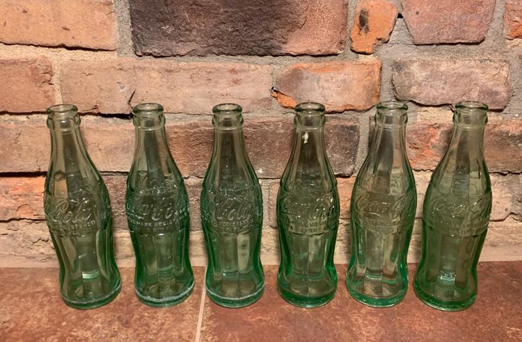 1. Set of 6 Coca-Cola Collectible Green Glass Hobble Skirt Bottles