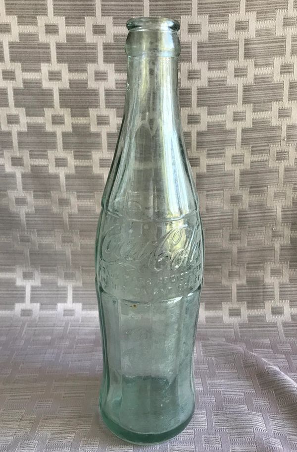 2. Antique Coca-Cola Bottle 12 Fluid Ounces with Ribbing and Bottom Stamping