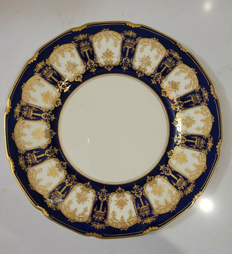 12 Royal Doulton Cobalt dinner plates gilded