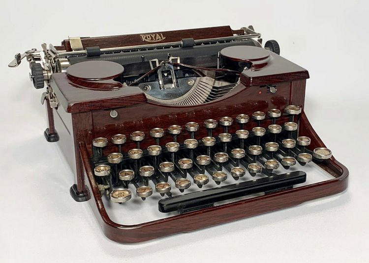 A Vintage 1930 Royal Model P Wood Grain Portable Typewriter