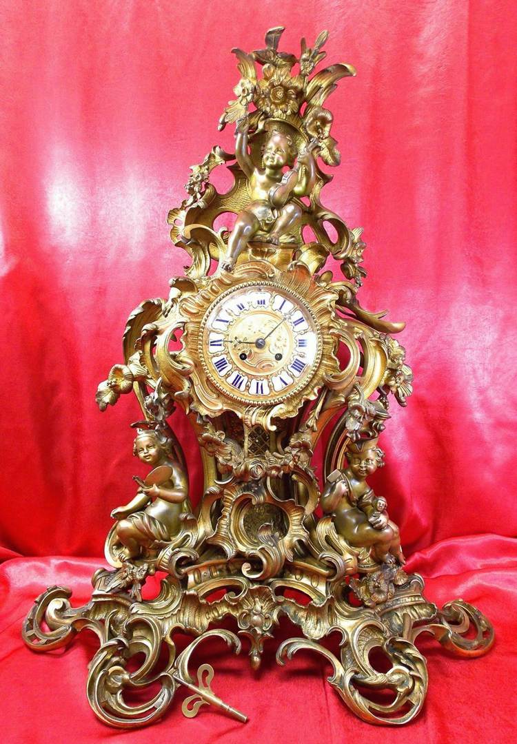 Antique French Mantel Clock Gilt Bronze Circa 1870's With Putti Figurines