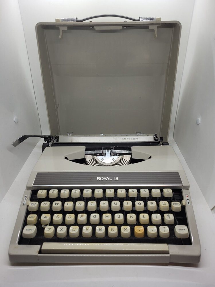 Vintage 1970's Royal Mercury Manual portable typewriter with lid