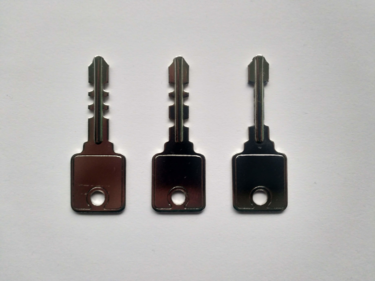 Keys for some types of warded locks often have a characteristic symmetrical shape