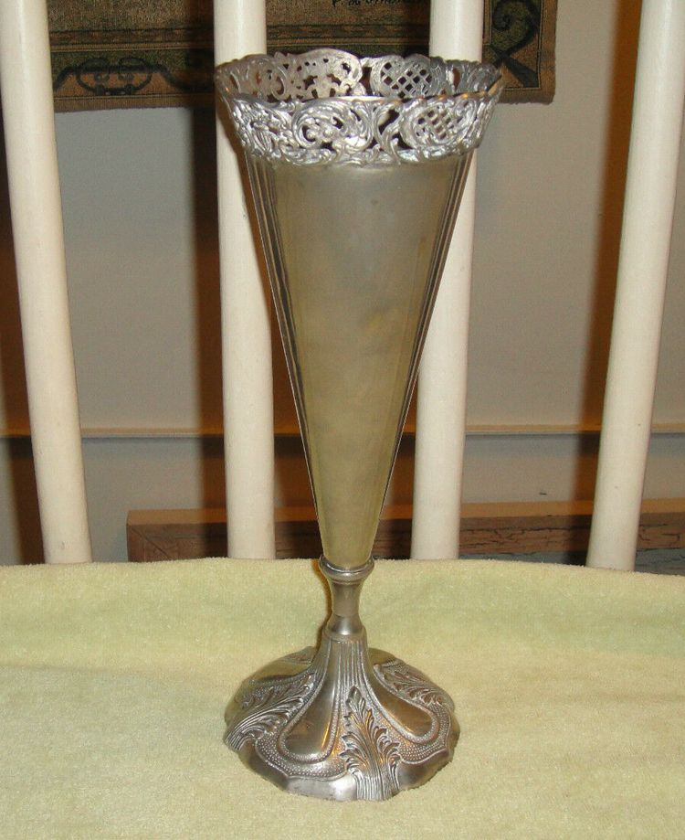 Silver Metal Vases ($50-$1,500)