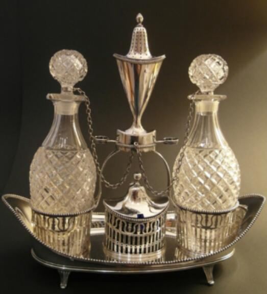 Silver condiment set on a silver tray