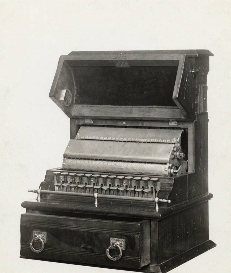 This is a photograph of the first National Cash register ever used. It was used at the Miners' Supply Co. in Coalton, Ohio.