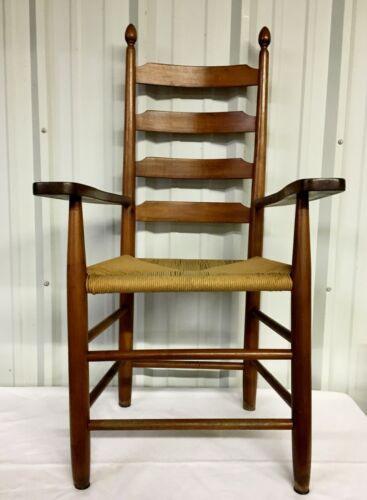 A classic maple shaker style ladder back chair