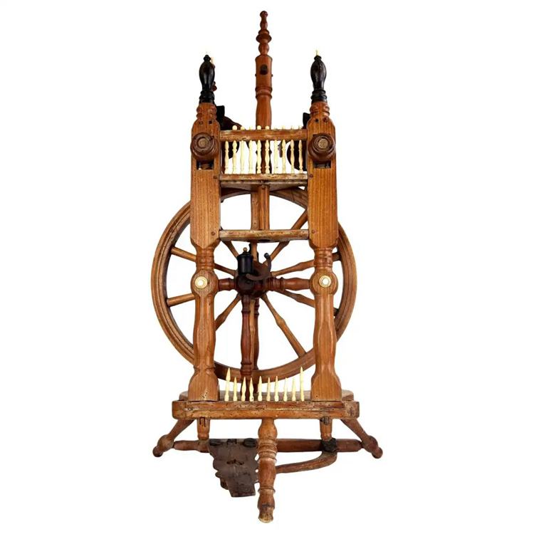 An 18th-century Dutch-style spinning wheel with bone ornaments