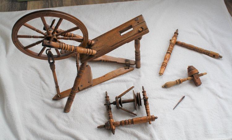 This completely dismantled spinning wheel