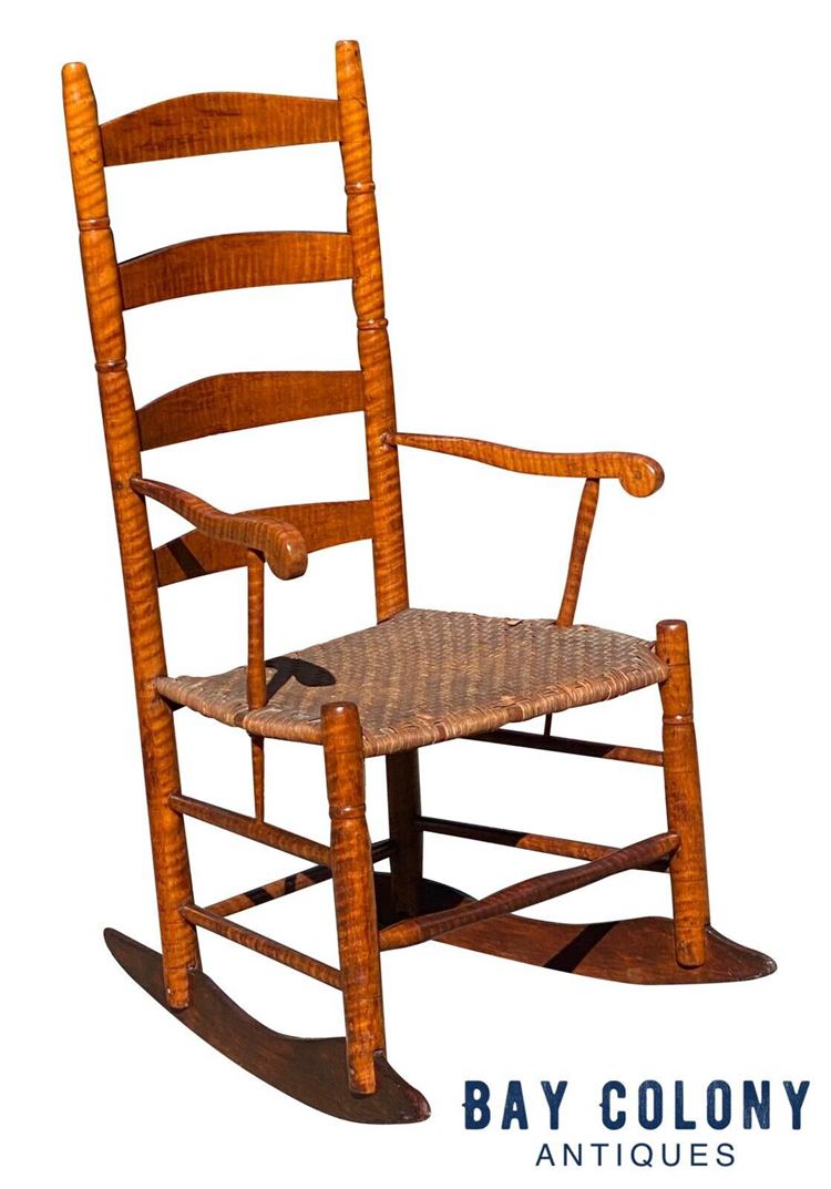 This tiger maple, Queen Anne style rocking chair