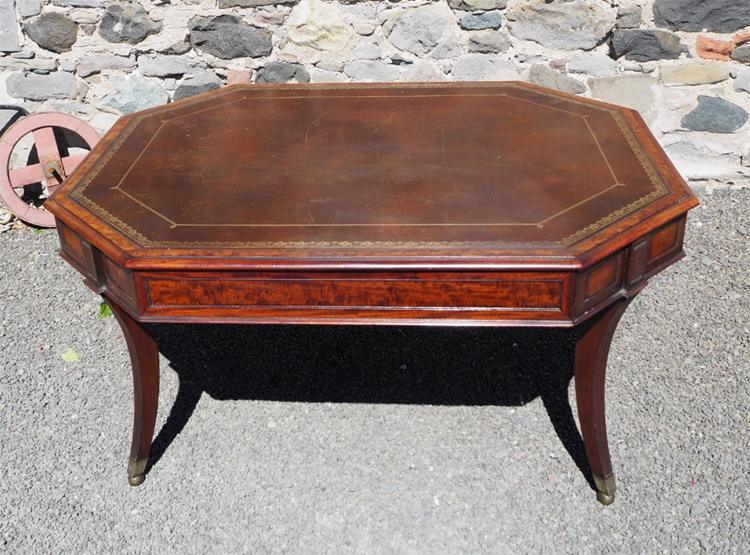 this Regency period gilt leather top library table