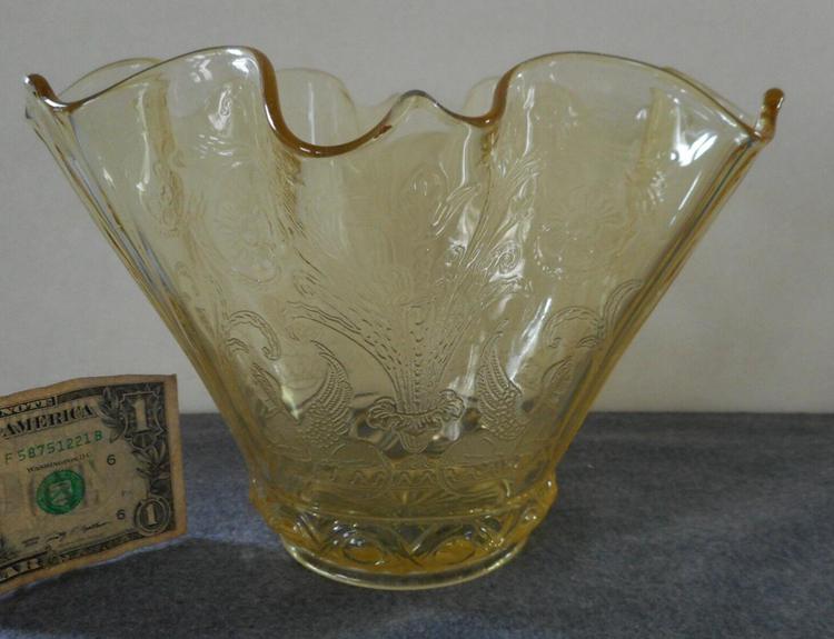 A Yellow Lancaster Depression Glass Sphinx Pattern