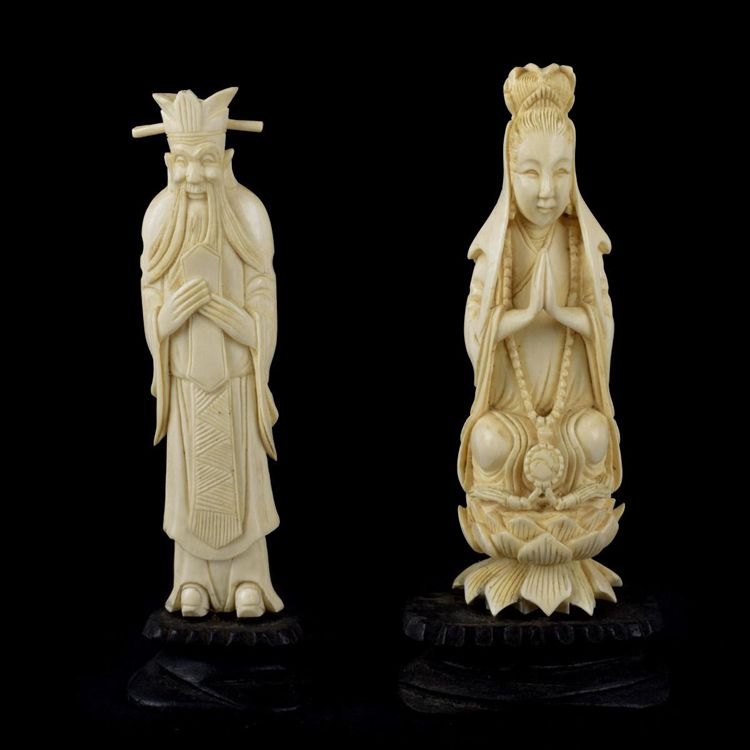 Antique Chinese Carved Guanyin Figurine along with an Antique Chinese Carved Immortal Figurine sold for $150