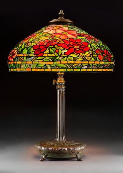 Tiffany Studios leaded glass and bronze Peony table lamp, circa 1915 sold for $93,750