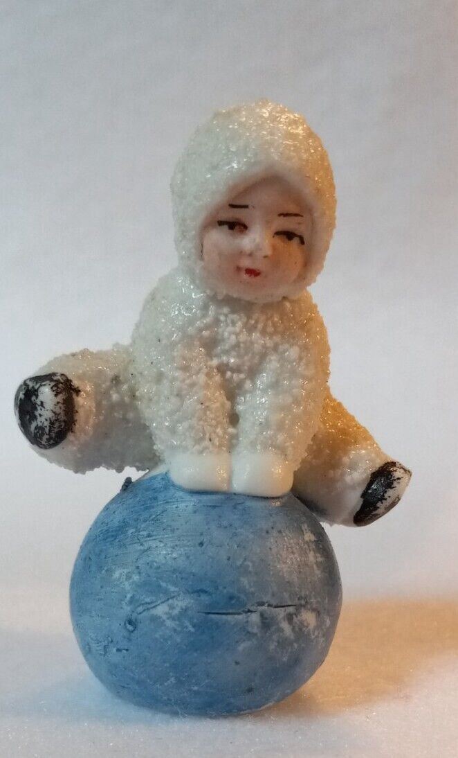 Antique Snowbaby Leaping A Blue Snowball